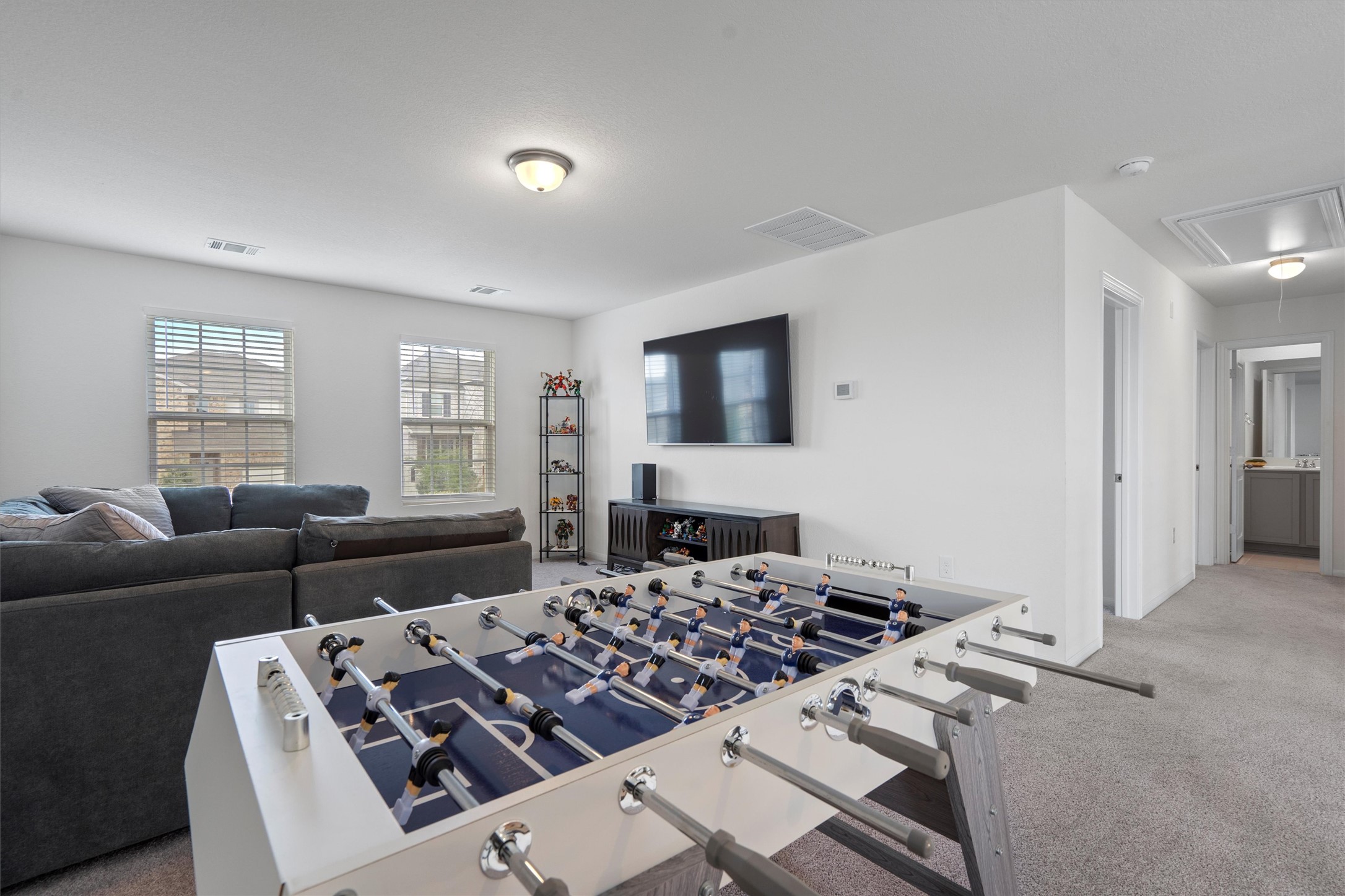 6720 Coalinga Lane Pflugerville, TX 78660 - Photo 25 of 38 a living room with furniture a couch and a window