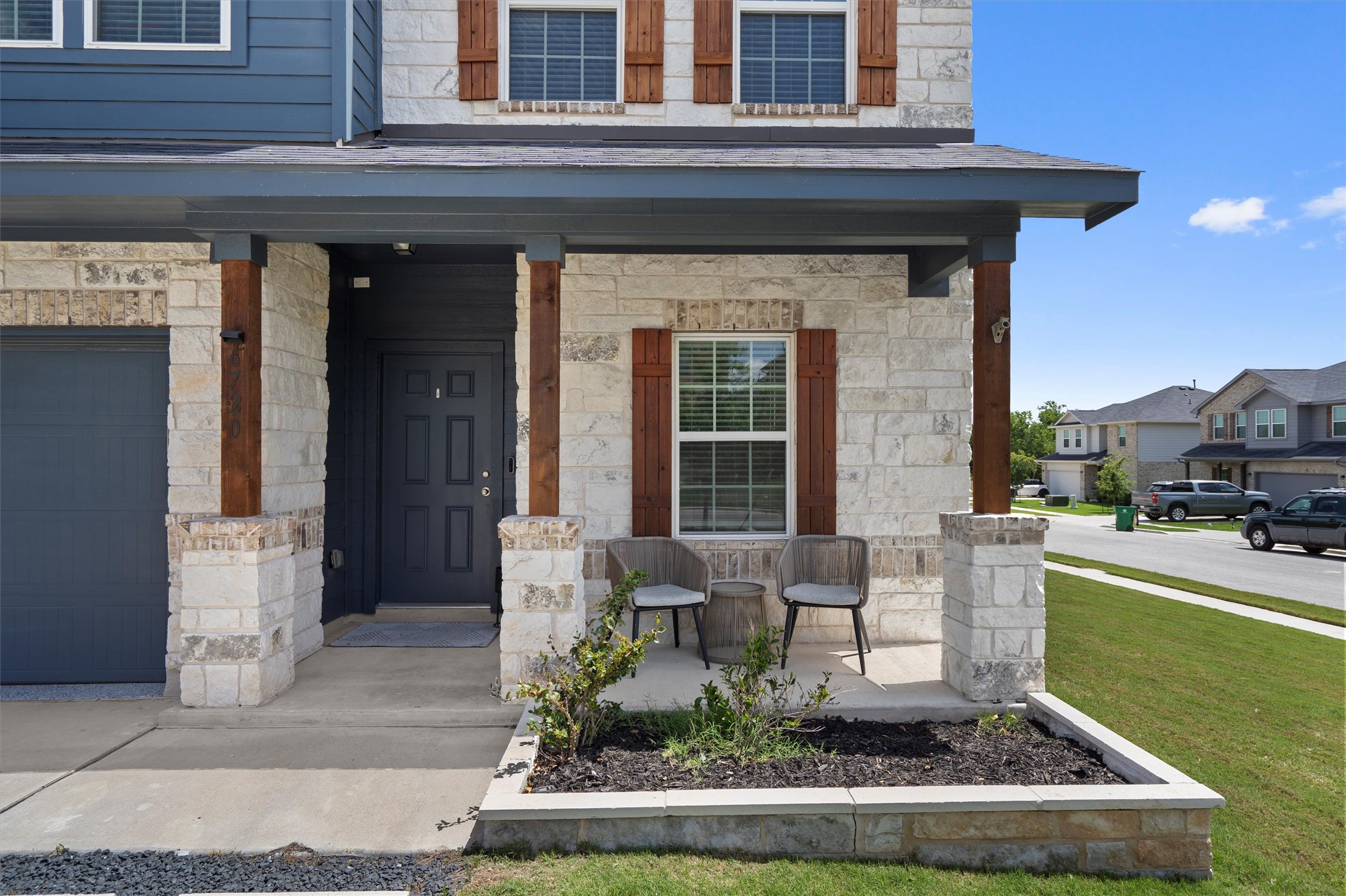 6720 Coalinga Lane Pflugerville, TX 78660 - Photo 3 of 38 a front view of a house with garden