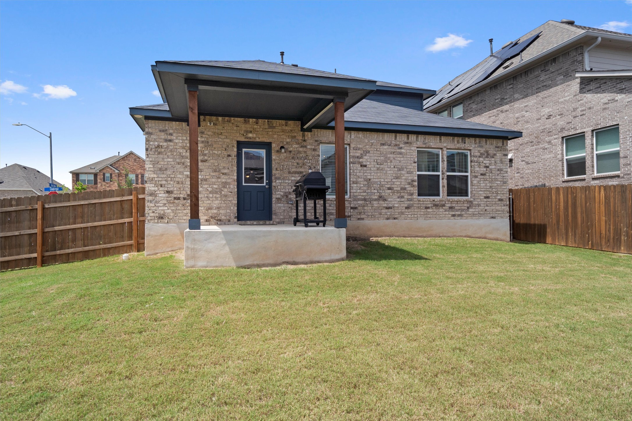6720 Coalinga Lane Pflugerville, TX 78660 - Photo 35 of 38 a view of a house with a backyard