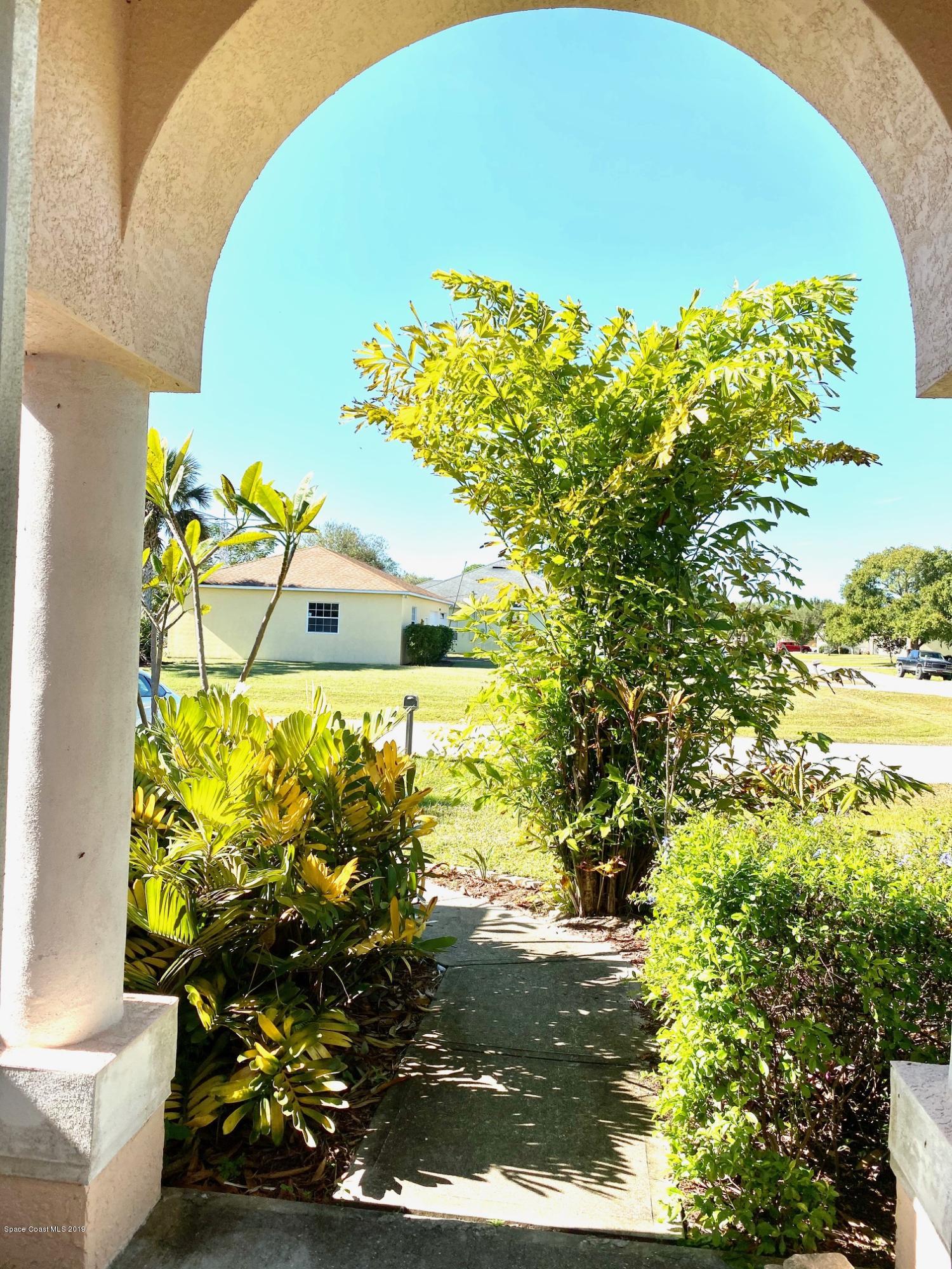 125 Benchor Road Northwest Palm Bay, FL 32907 - Photo 8 of 12 Front walkway