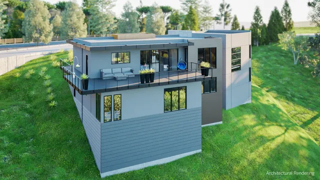 a view of a house with backyard and balcony