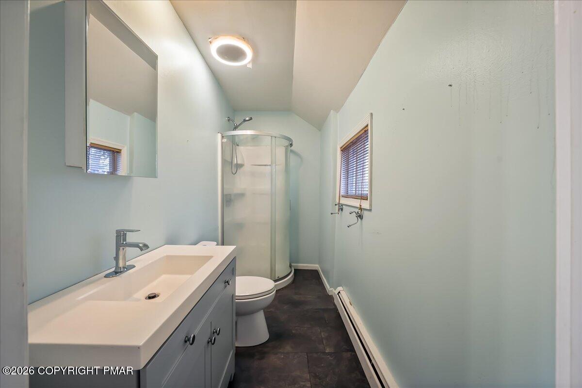 1191 Aberdeen Road Moscow, PA 18444 - Photo 12 of 19 a bathroom with a toilet sink and a mirror