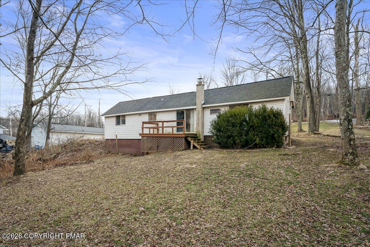 1191 Aberdeen Road Moscow, PA 18444 - Photo 17 of 19 a view of a house with a yard covered in the road
