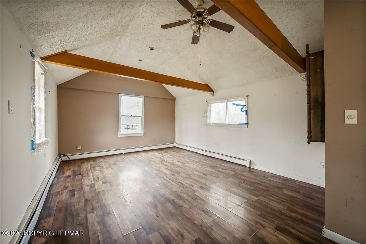 1191 Aberdeen Road Moscow, PA 18444 - Photo 4 of 19 an empty room with wooden floor and windows