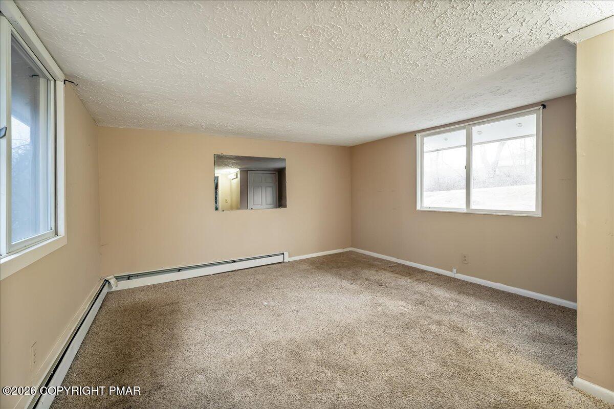 1191 Aberdeen Road Moscow, PA 18444 - Photo 10 of 19 an empty room with a window