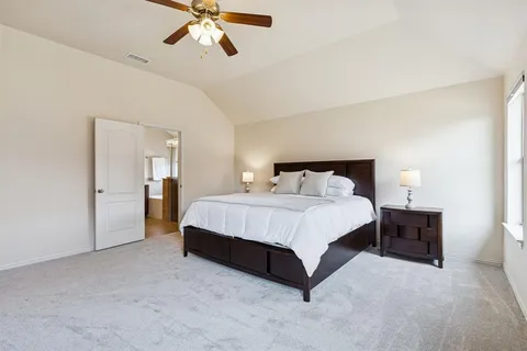 a bedroom with a bed and closet