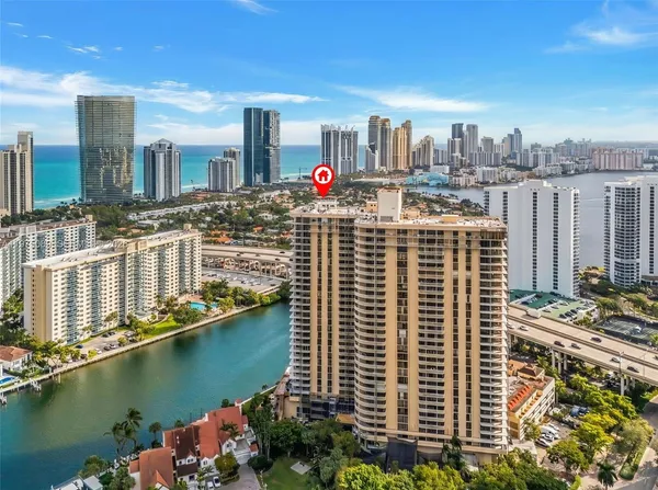 a view of a city with tall buildings