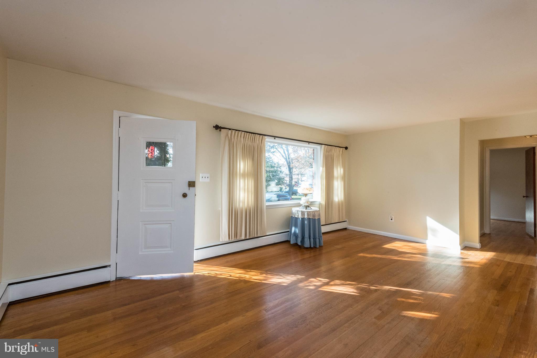 213 Sun Glo Road Pasadena, MD 21122 - Photo 2 of 30 Living Room with plenty of natural light