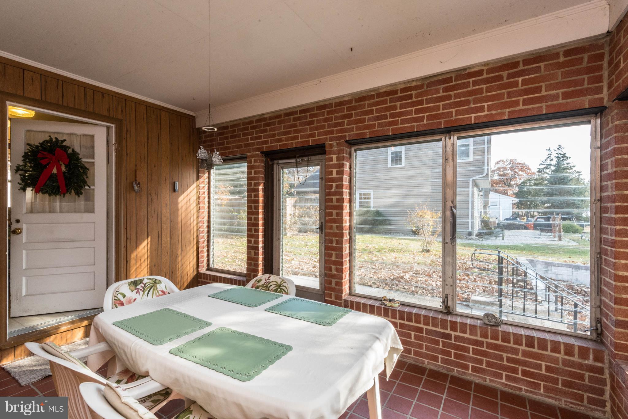 213 Sun Glo Road Pasadena, MD 21122 - Photo 9 of 30 Porch adds to living and entertaining space