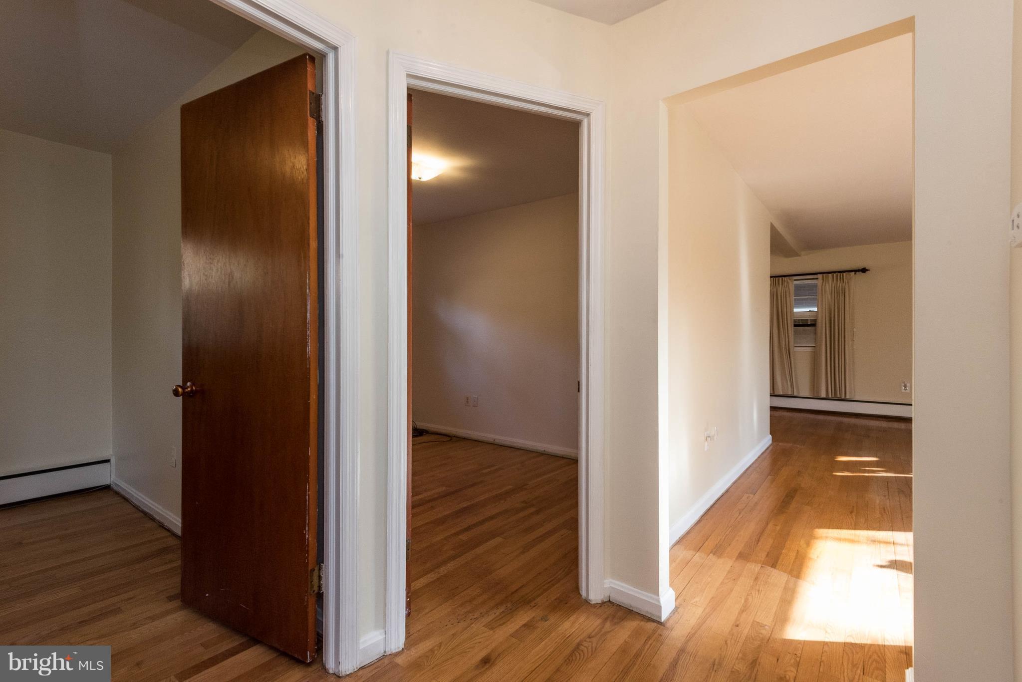 213 Sun Glo Road Pasadena, MD 21122 - Photo 10 of 30 Bedroom hallway looking into living room