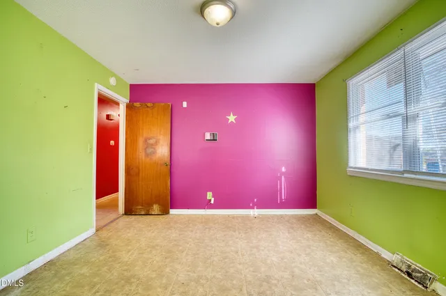a bathroom with a sink toilet vanity and shower