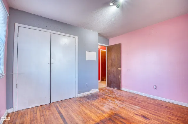 a view of house with backyard of house