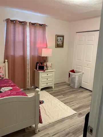 a room with toys and flat screen tv