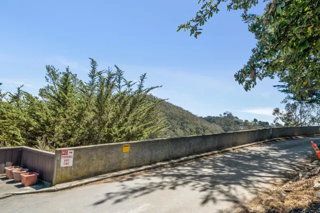 a view of a lake from a balcony