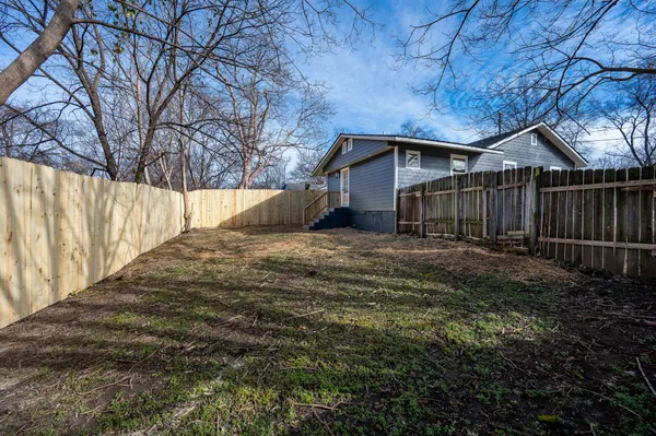 a view of backyard of house