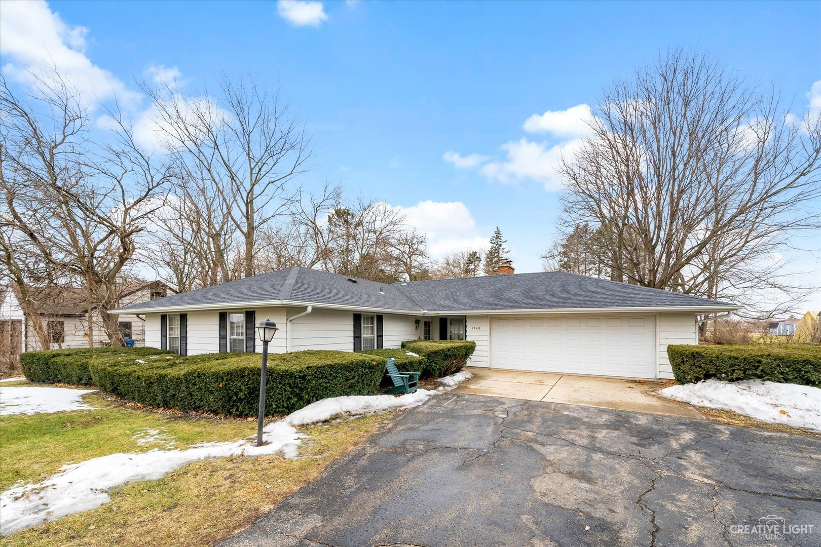 1268 North Randall Road Aurora, IL 60506 - Photo 1 of 28 a front view of a house with a yard and garage