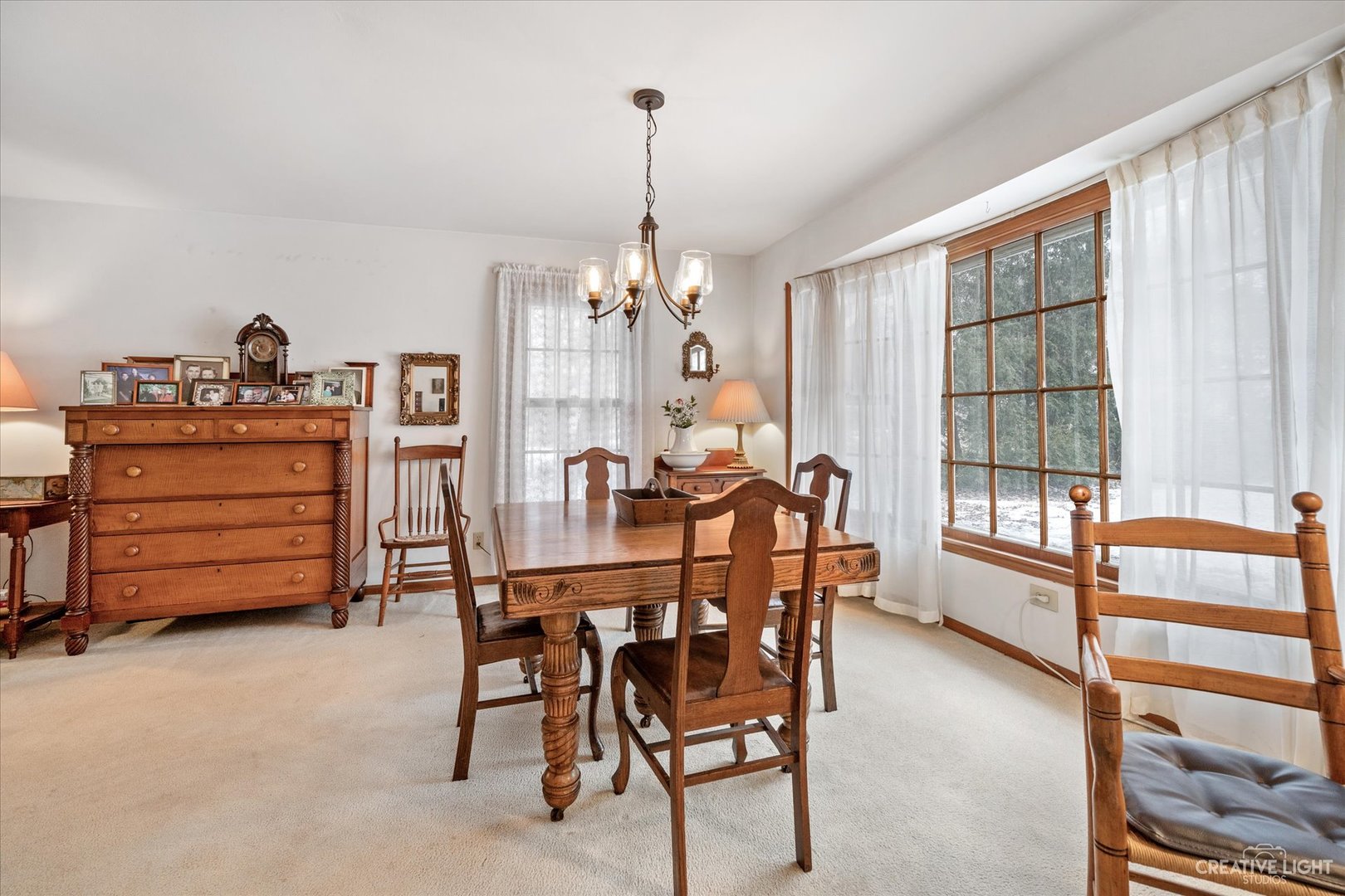 1268 North Randall Road Aurora, IL 60506 - Photo 12 of 28 a dining room with furniture and window