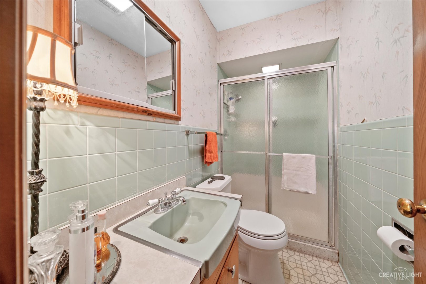 1268 North Randall Road Aurora, IL 60506 - Photo 20 of 28 a bathroom with a sink toilet and shower