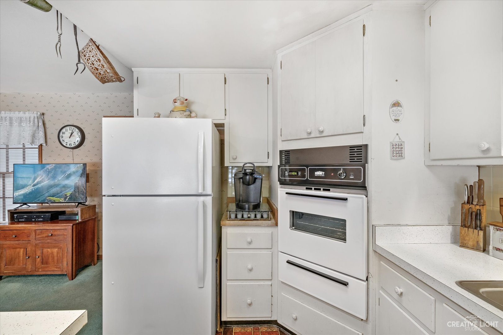 1268 North Randall Road Aurora, IL 60506 - Photo 8 of 28 a white refrigerator freezer sitting in a kitchen