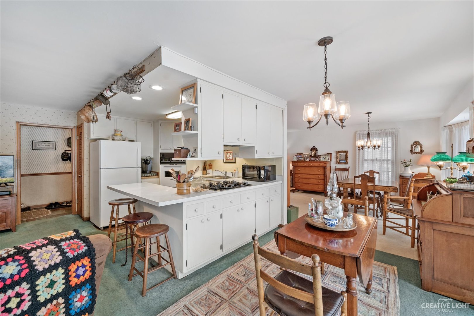 1268 North Randall Road Aurora, IL 60506 - Photo 10 of 28 a large kitchen with a table and chairs