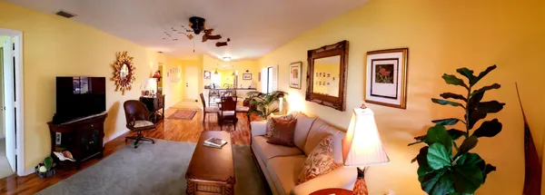 a view of a living room and bathroom