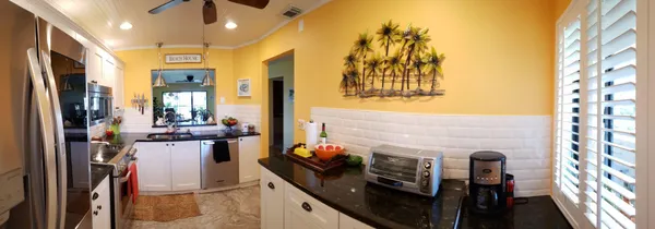 a view of living room with furniture and flat screen tv