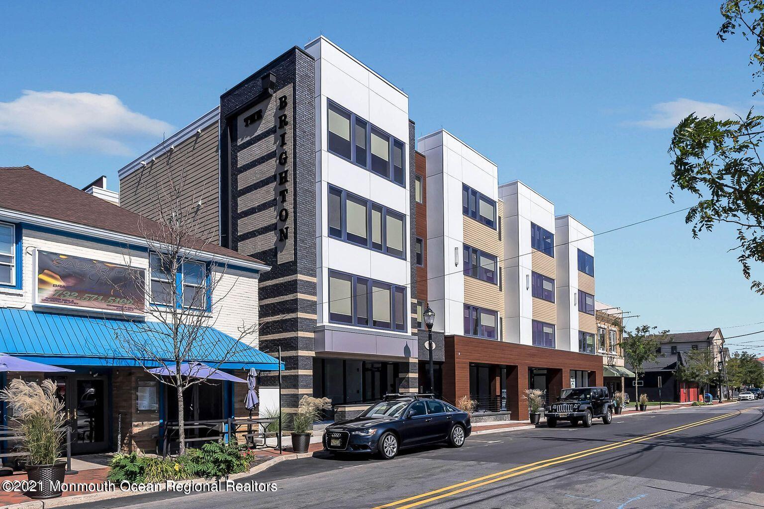 131 Brighton Avenue, Unit 301 Long Branch, NJ 07740 - Photo 3 of 31 a front view of a building with street