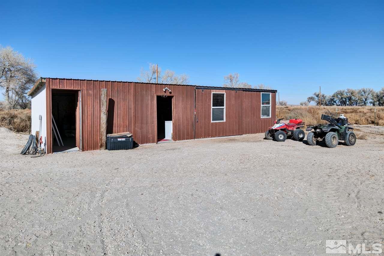 5954 Workman Road Fallon, NV 89406 - Photo 15 of 21 a view of a house with a backyard