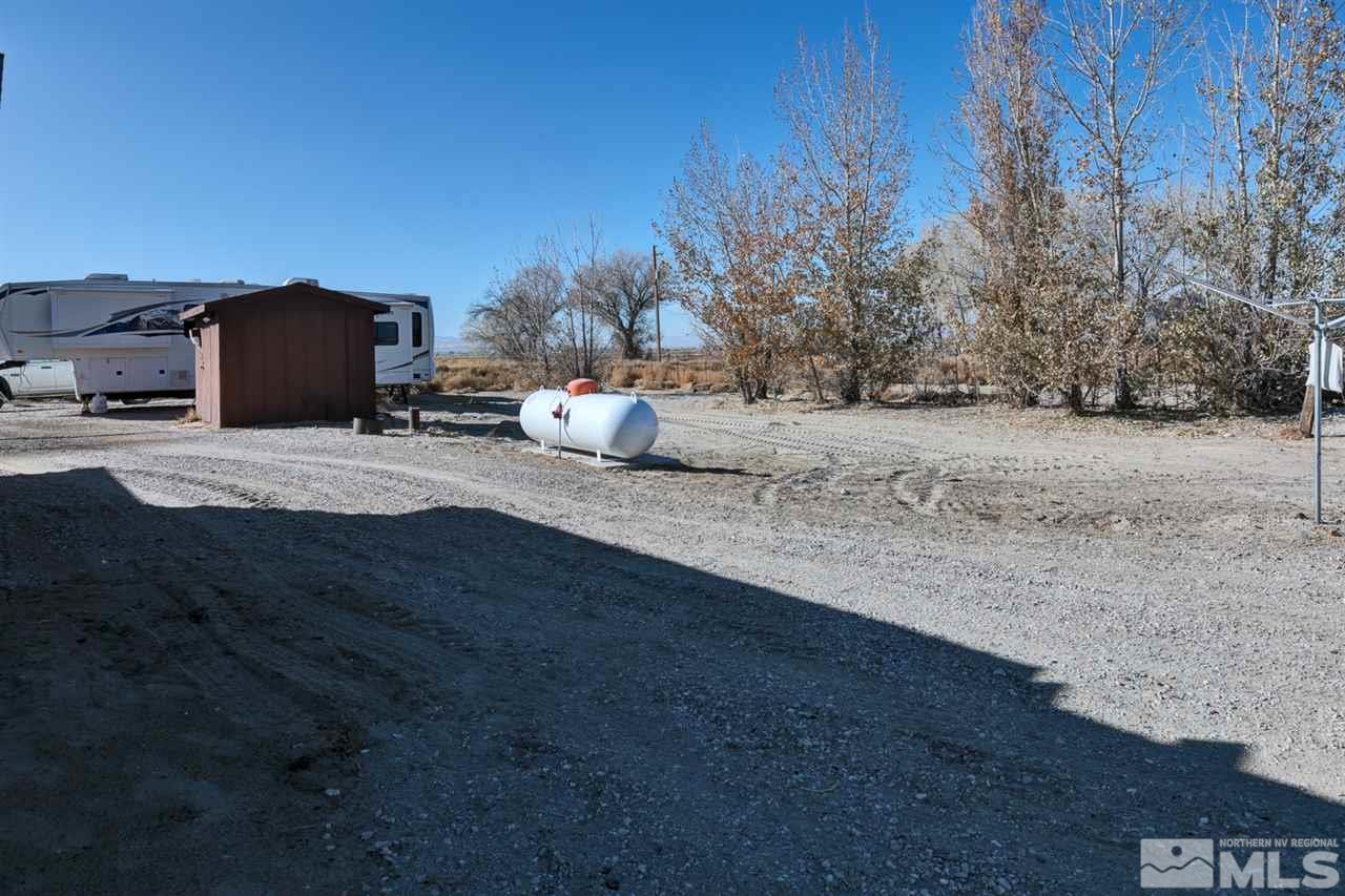 5954 Workman Road Fallon, NV 89406 - Photo 17 of 21 a row of beach with large trees