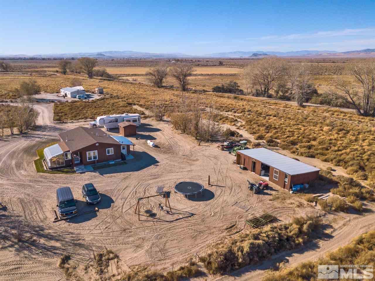 5954 Workman Road Fallon, NV 89406 - Photo 2 of 21 an aerial view of residential houses with outdoor space