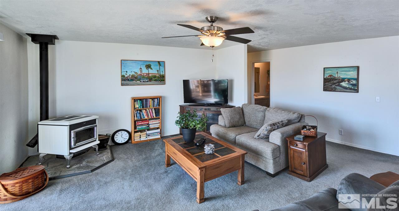 5954 Workman Road Fallon, NV 89406 - Photo 3 of 21 a living room with furniture and a flat screen tv
