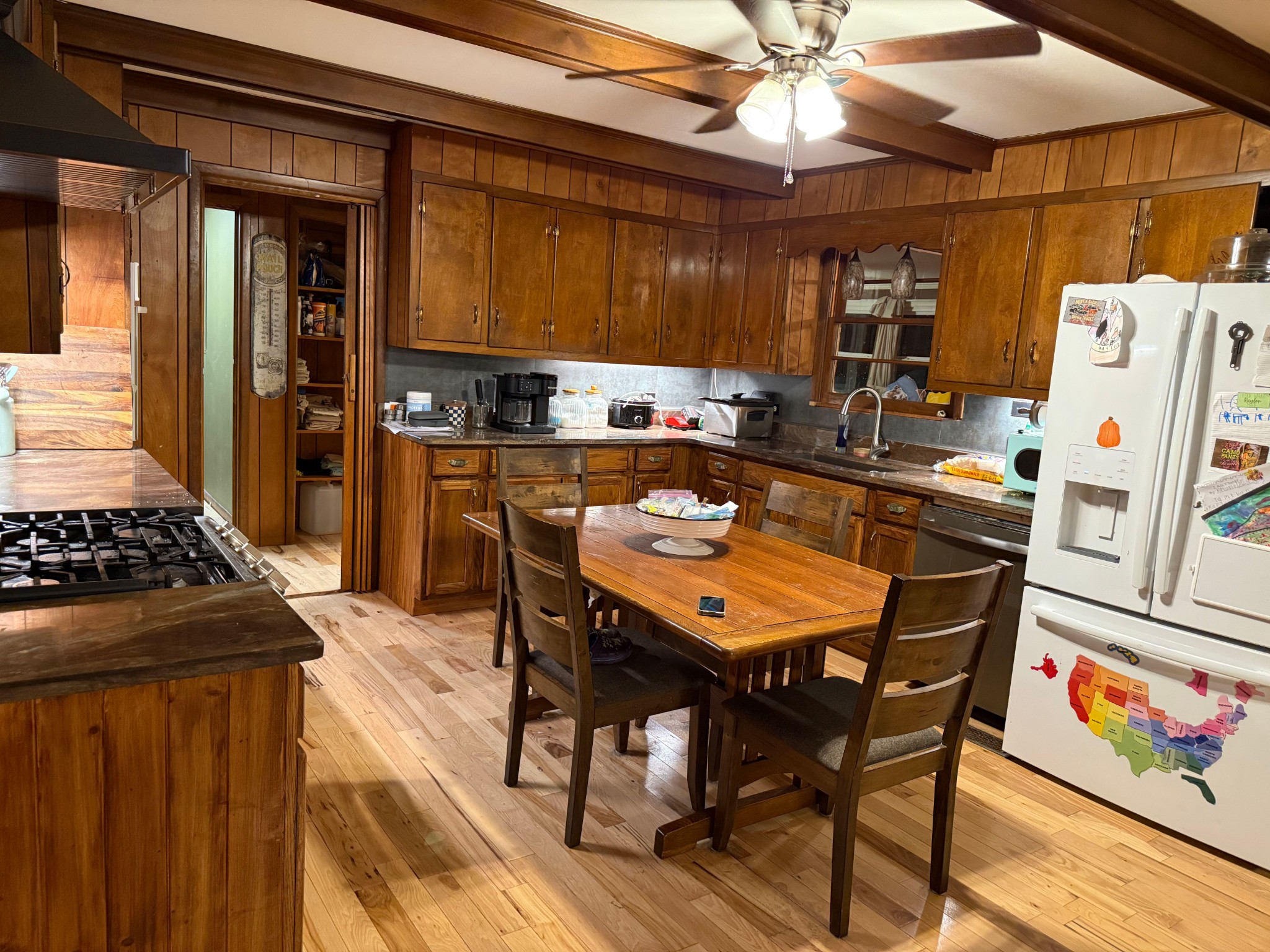 3681 Richmond Road Petersburg, TN 37144 - Photo 7 of 14 a kitchen with a table and chairs in it