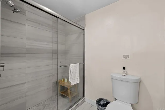 a view of a chairs and table in patio