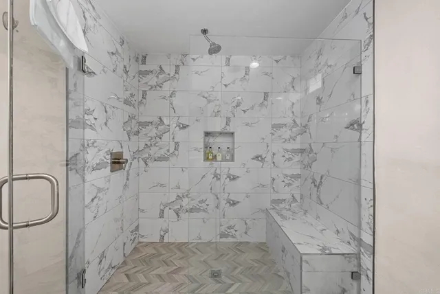 a view of a balcony with furniture