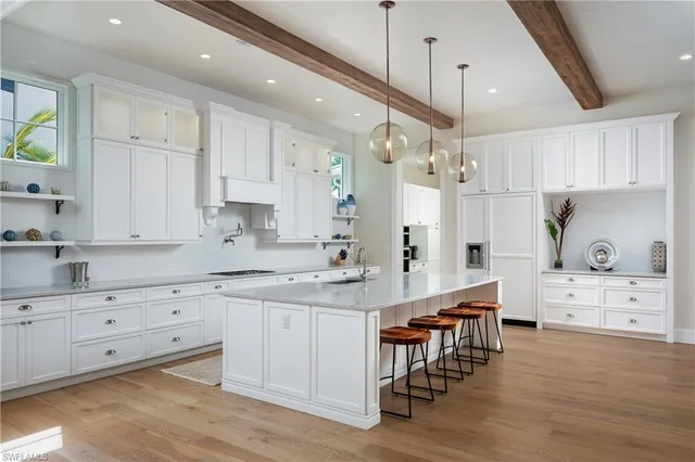 a large kitchen with cabinets