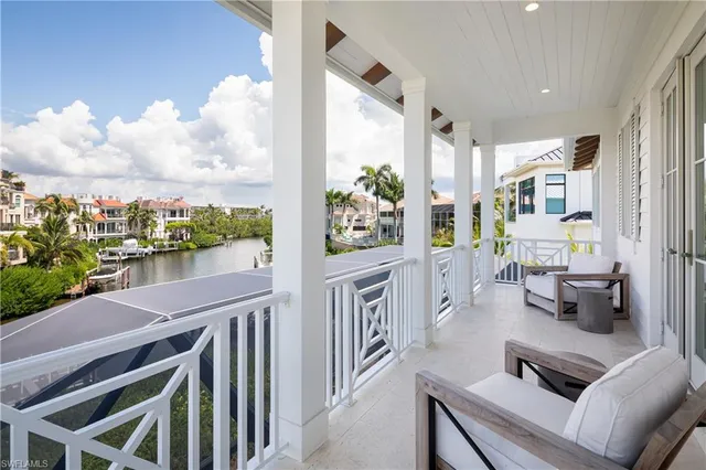 a view of open kitchen with seating area