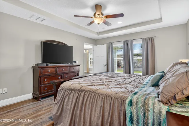 a view of a garage with rack and bicycle