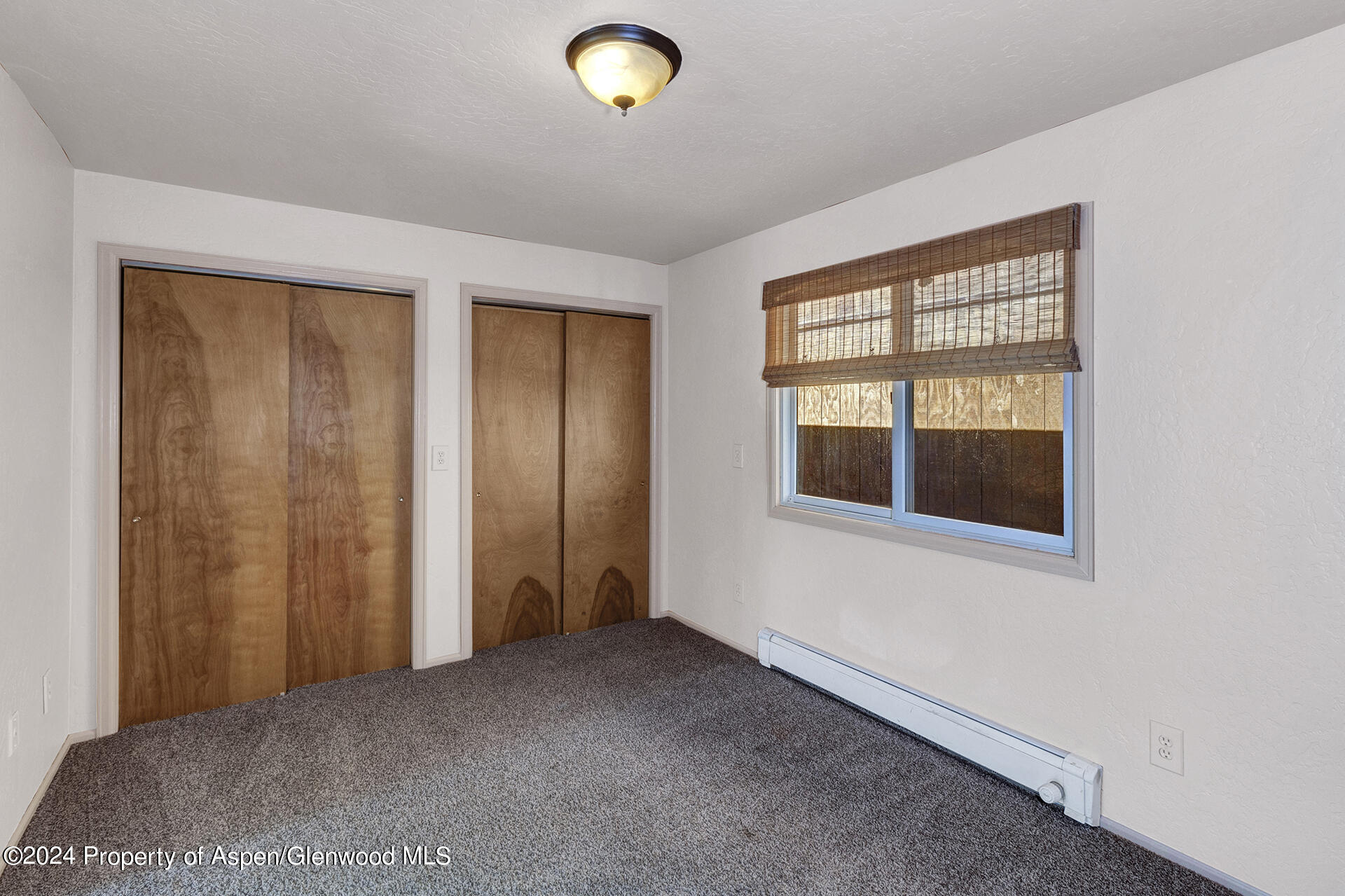 674 Mesa Court Rifle, CO 81650 - Photo 17 of 38 an empty room with windows