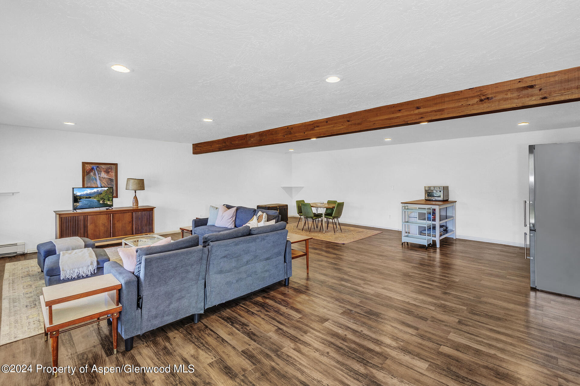 674 Mesa Court Rifle, CO 81650 - Photo 19 of 38 a living room with furniture and a wooden floor