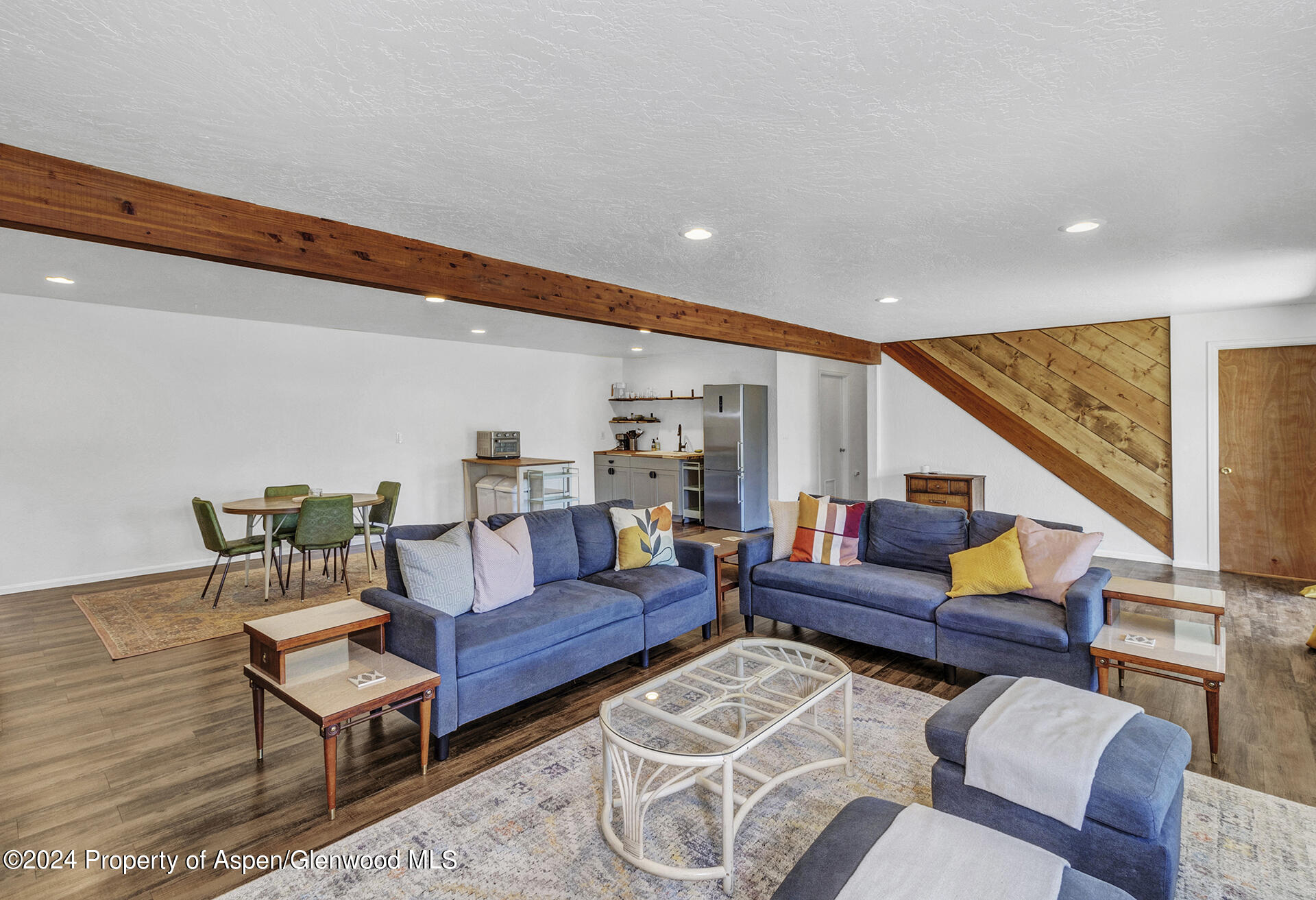 674 Mesa Court Rifle, CO 81650 - Photo 21 of 38 a living room with furniture and a wooden floor
