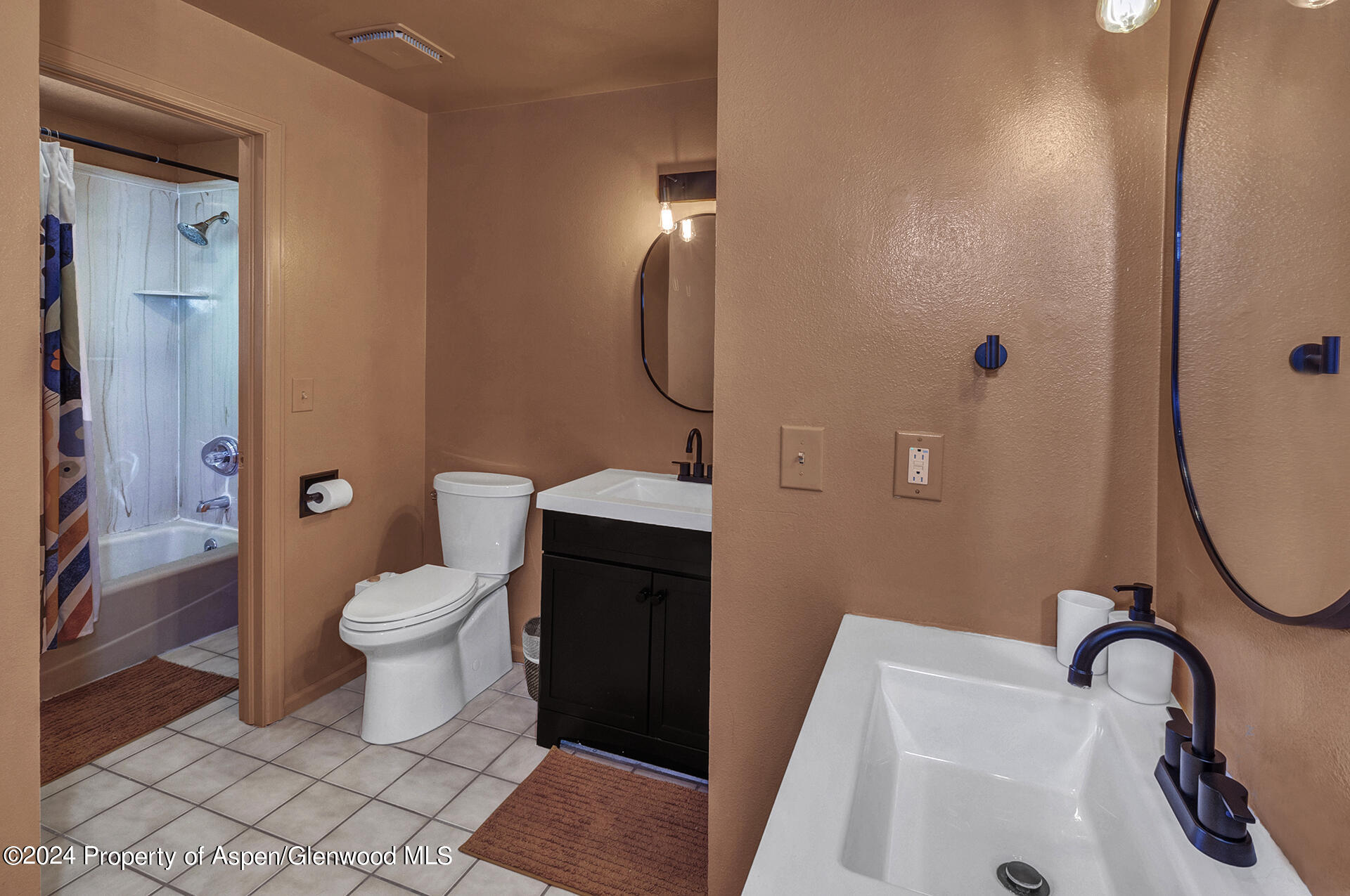 674 Mesa Court Rifle, CO 81650 - Photo 25 of 38 a bathroom with a sink toilet and shower