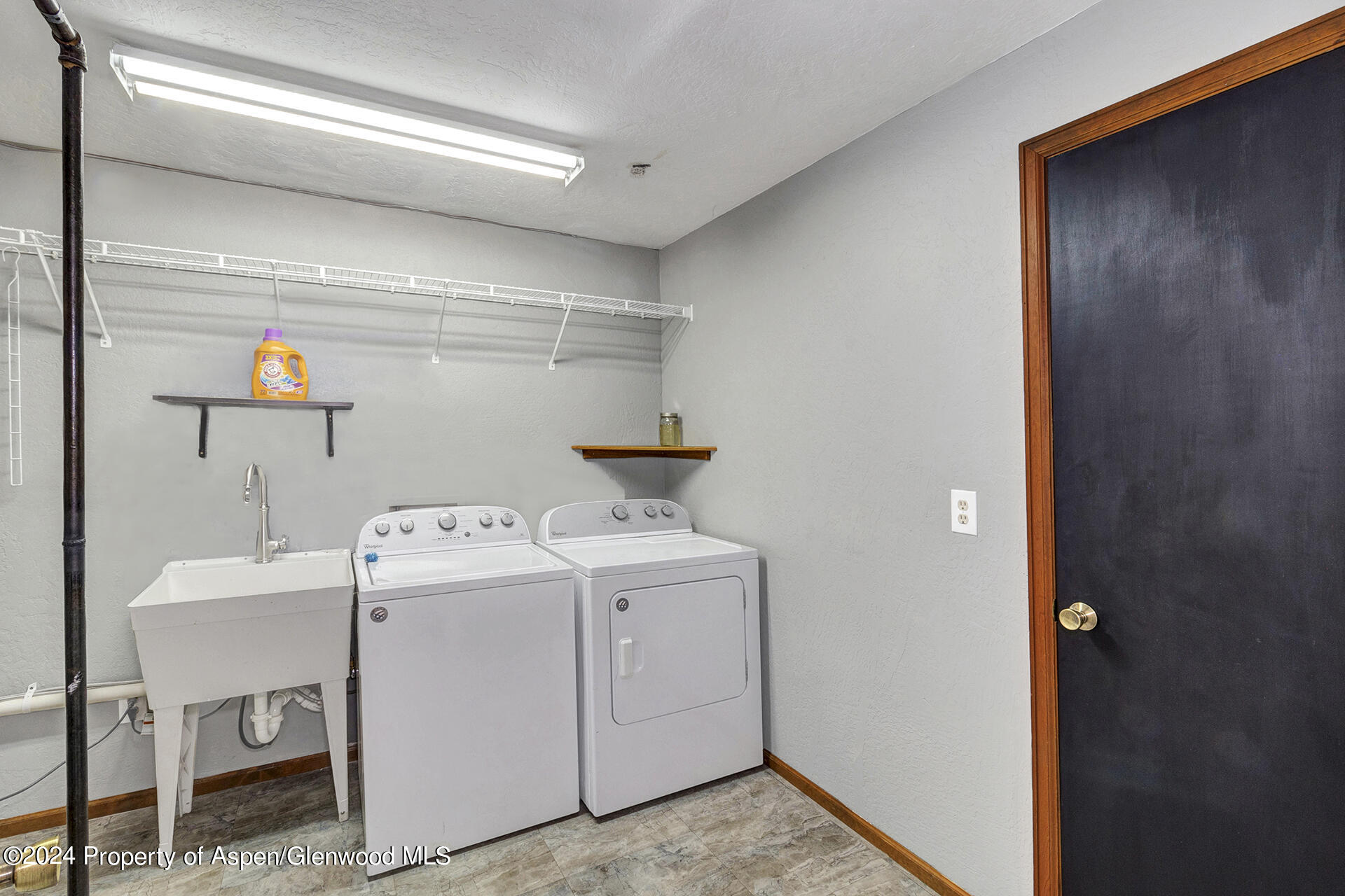674 Mesa Court Rifle, CO 81650 - Photo 28 of 38 a utility room with dryer and washer