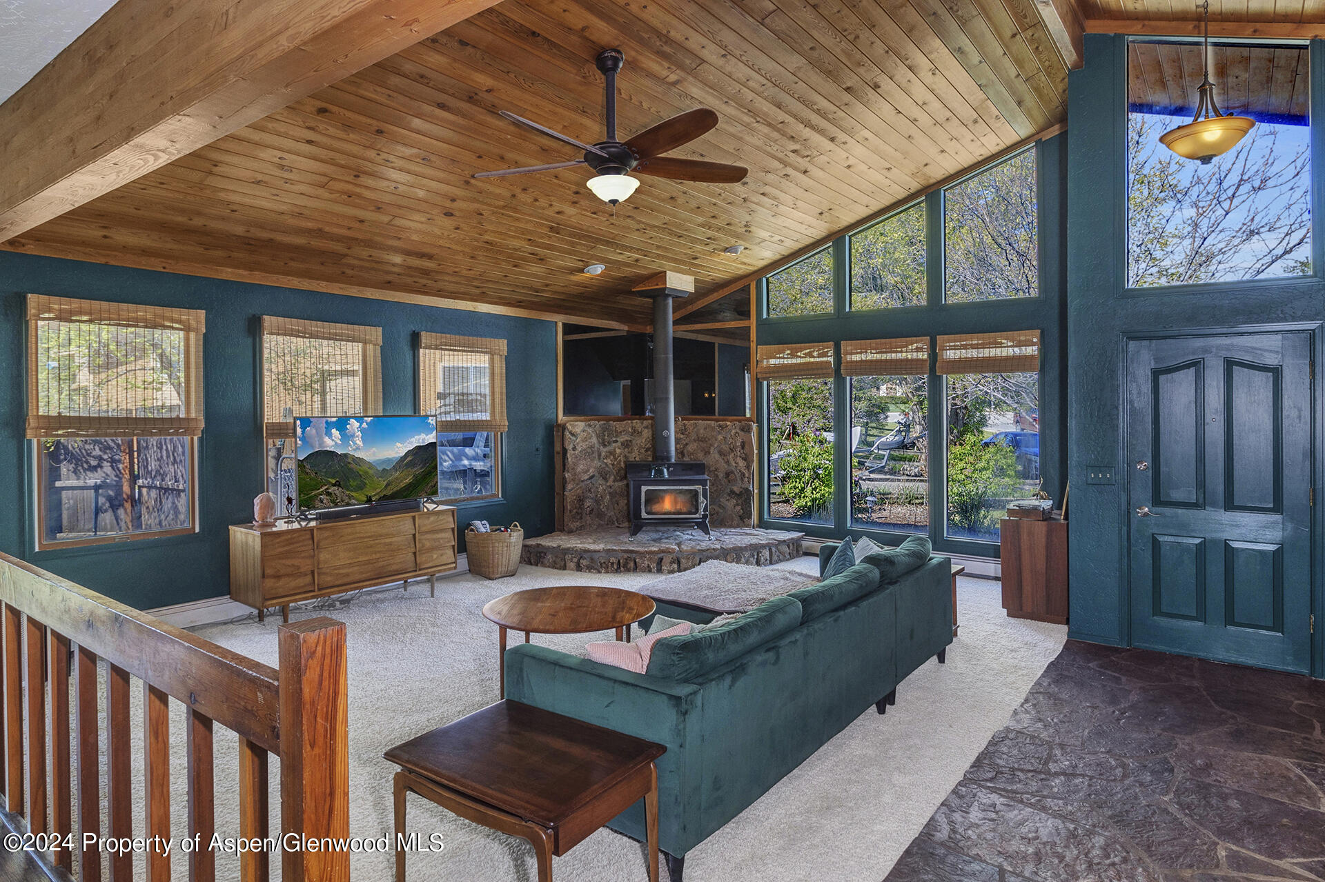 674 Mesa Court Rifle, CO 81650 - Photo 5 of 38 a living room with furniture and a large window
