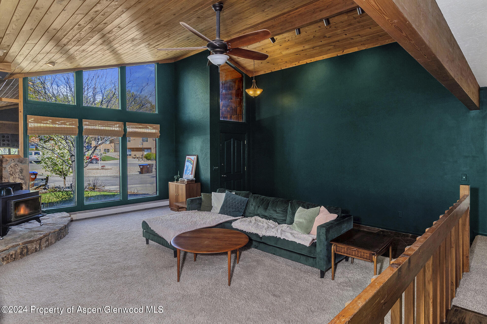 674 Mesa Court Rifle, CO 81650 - Photo 6 of 38 a outdoor living space with furniture and a fireplace
