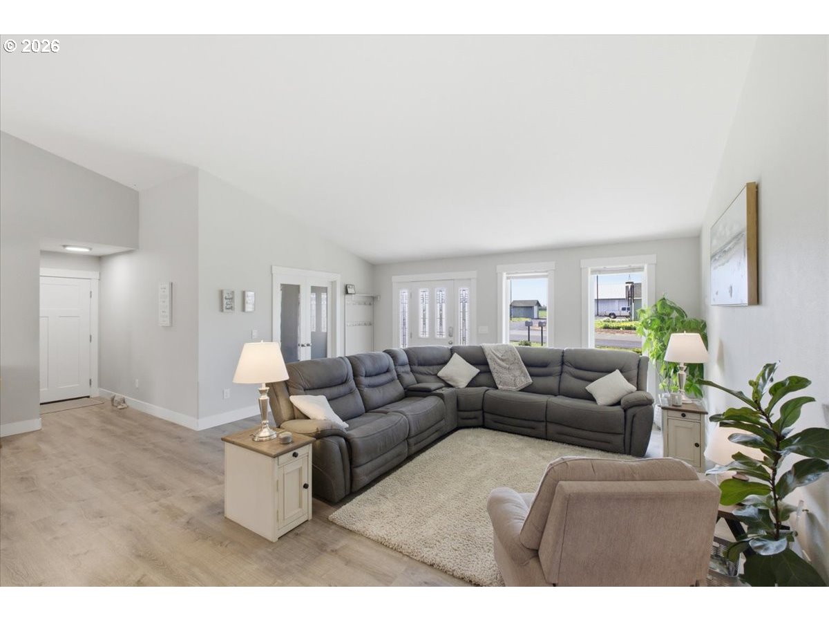 12008 Duck Inn Road Northeast Gervais, OR 97026 - Photo 12 of 48 a living room with furniture and a potted plant