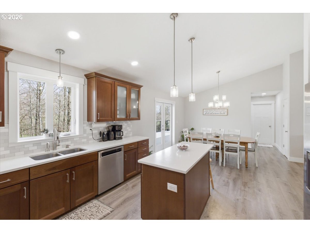 12008 Duck Inn Road Northeast Gervais, OR 97026 - Photo 19 of 48 a large kitchen with a table and chairs