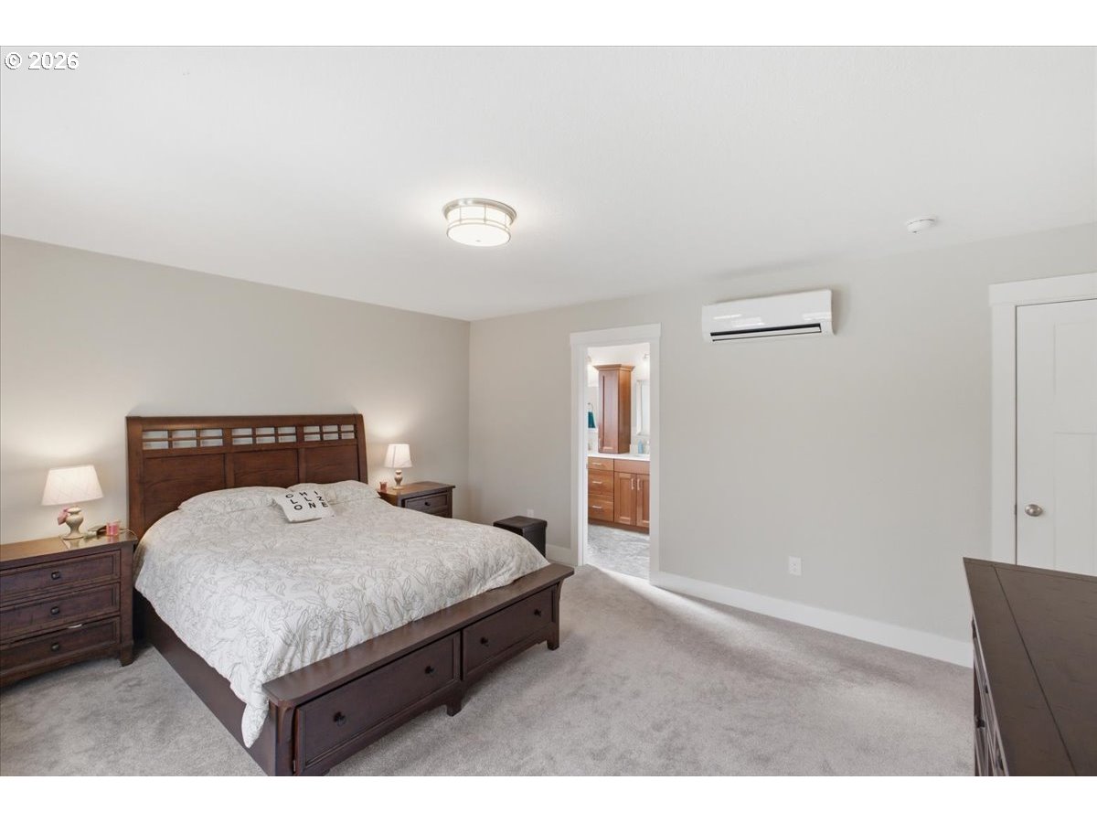 12008 Duck Inn Road Northeast Gervais, OR 97026 - Photo 22 of 48 a bedroom with a bed and window