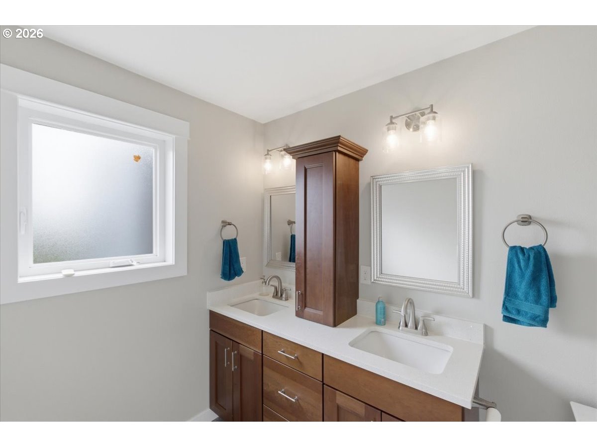 12008 Duck Inn Road Northeast Gervais, OR 97026 - Photo 23 of 48 a bathroom with a sink and a mirror