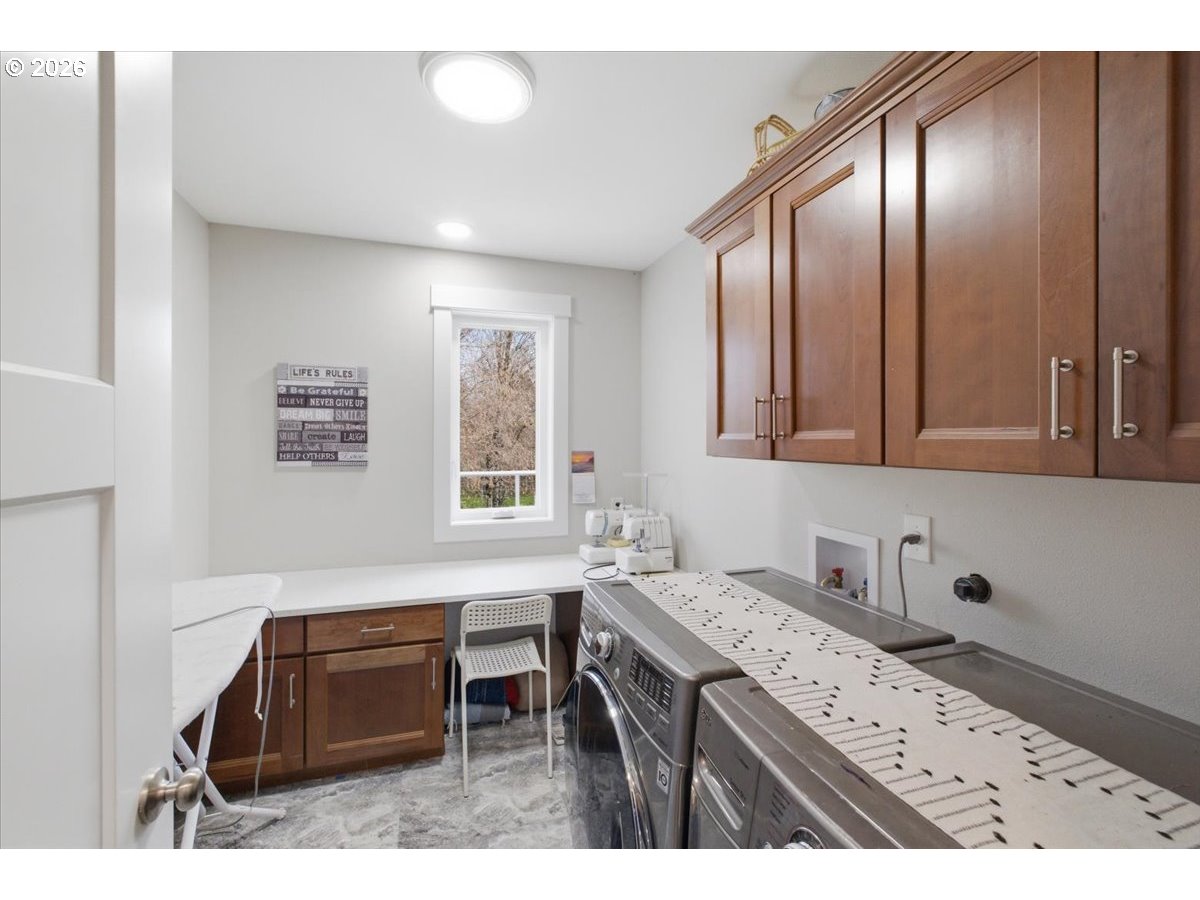 12008 Duck Inn Road Northeast Gervais, OR 97026 - Photo 25 of 48 a bathroom with a sink and a mirror