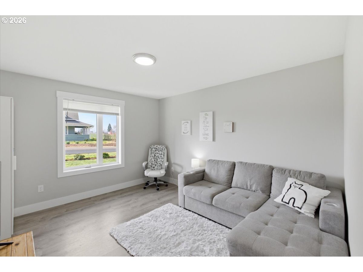 12008 Duck Inn Road Northeast Gervais, OR 97026 - Photo 30 of 48 a living room with furniture and a window